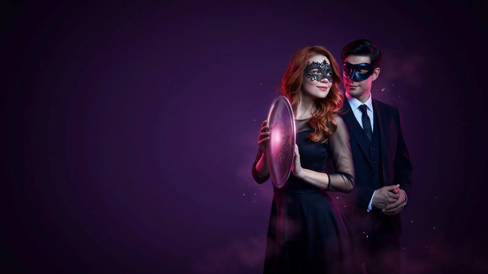 A glowing shield on a dark purple background
